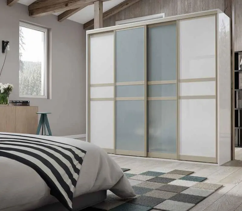 Sliding wardrobe visualisation in an attic bedroom with white gloss and frosted glass panels in a champagne frame